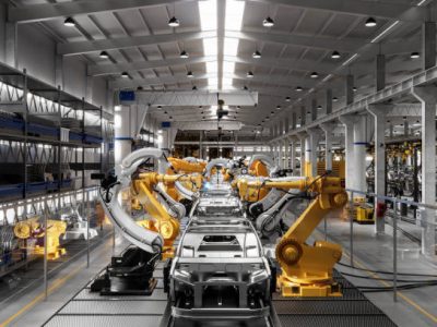 Robotic welding production line in car factory. Computer generated image of a vehicle manufacturing company.